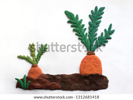 Plasticine garden with carrots. Cartoon illustration on a white background.
 Royalty-Free Stock Photo #1312681418