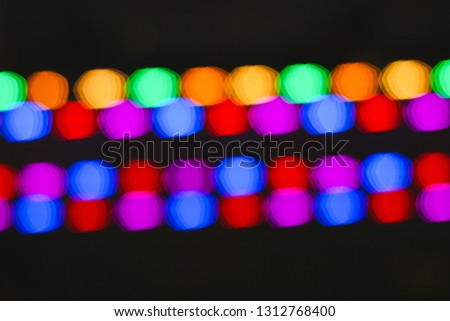 Abstract blurred bokeh celebration background, Christmas party night with colorful light line circle defocus bokeh.Vintage film tone.