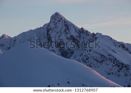 Winter sunset Gurnigel pass with Gantrisch, Swiss Alps