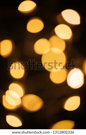 garland lights on black background with blur bokeh