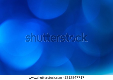 Abstract blue background. Texture bokeh. Defocused image.