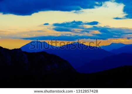Late afternoon sunset light over the Dolomite Alps, Italy