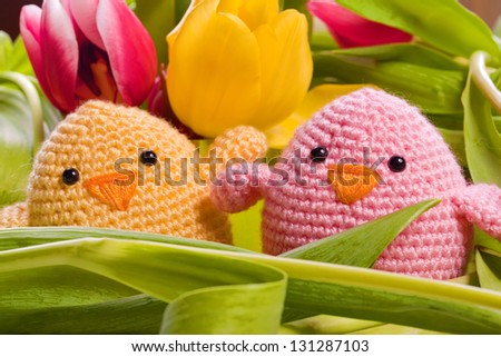 easter and spring decoration with chick and tulip flowers