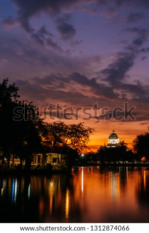 Ananta Samakhom Throne Hall after the rain in sunset time. The place is a royal reception hall within Dusit Palace in Bangkok, Thailand, beautiful picture in twilight with colorful sky