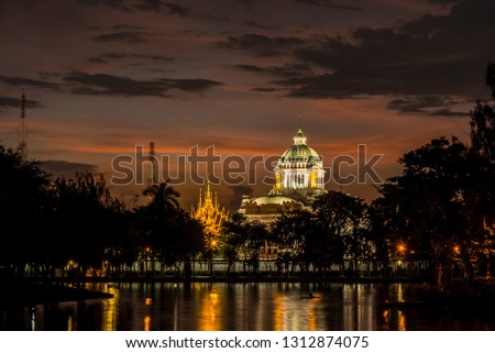 Ananta Samakhom Throne Hall after the rain in sunset time. The place is a royal reception hall within Dusit Palace in Bangkok, Thailand, beautiful picture in twilight with colorful sky