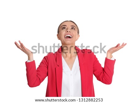 Young woman under rain of money on white background