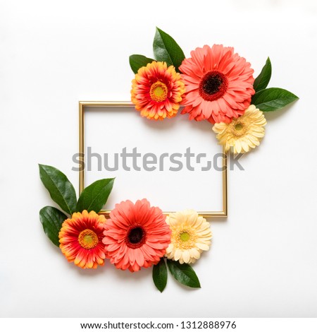 Happy Mother's Day, Women's Day, Valentine's Day or Birthday coral colored Background. Coral flat lay greeting card template with beautiful gerbera flowers.