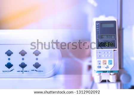Double exposure, Infusion pump, Remote control for bed in hospital. Royalty-Free Stock Photo #1312902092