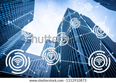 Modern buildings in blue tone with wifi icons connection, network communication in smart city