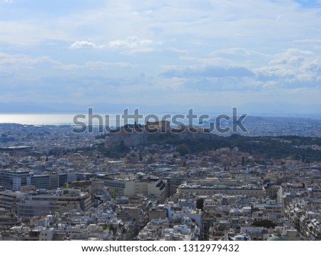 Zoom photo of iconic Acropolis hill and the Parthenon as seen from Lycabettus hill, Athens historic centre, Attica, Greece