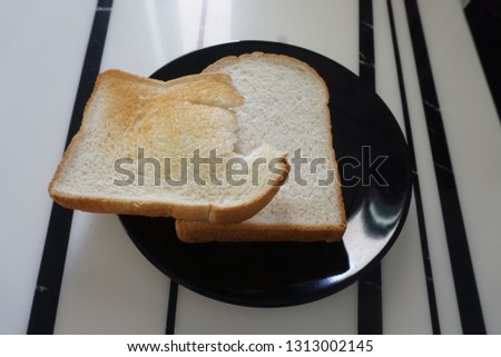 Bread on black dish