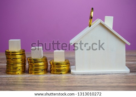 Text enabled conceptual photo on financial matter. Tax concerns on property sales. Selectively focused and isolated on pink background.