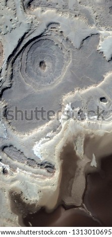 Dry Eye, tribute to Pollock, vertical abstract photography of the deserts of Africa from the air,aerial view, abstract expressionism, contemporary photographic art, abstract naturalism,