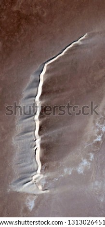 The speed of light, abstract photography of the deserts of Africa from the air. aerial view of desert landscapes, Genre: Abstract Naturalism, from the abstract to the figurative, 