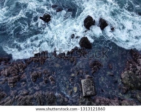 Rocky Beach Waves Breaking Aerial