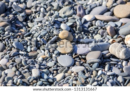 Stone seashore as abstract background .