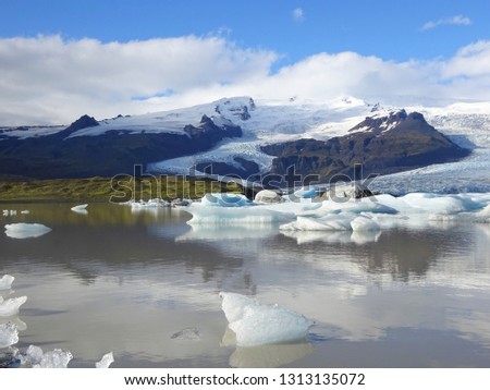                                A small, hidden glacial lagoon in Southern Iceland; Vatnajokull Glacier; Fjallsarlon