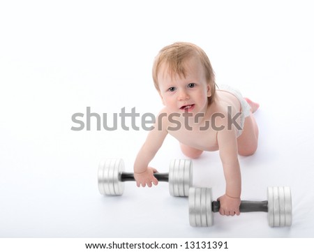 The little boy lifts dumbbells. On a white background.