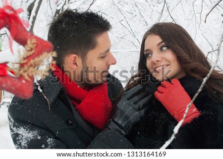 young couple of lovers hugging in the park. Young couple of lovers celebrating valentine's day 