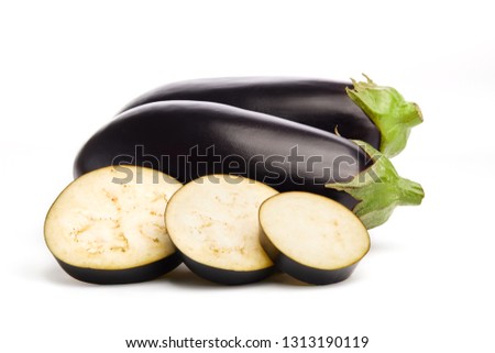 Two fresh Eggplants (aubergine) and cut eggplant isolated on white background, clipping path