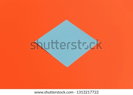 Blue paper on orange background