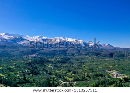 White Mountain Range, Lefkon Oreon, Pakhnes snowed in with cryztal clear blue sky, villages Pemonia, Fres, Tzitzifes and Nipos