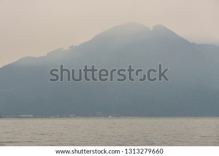 View at a Harrison Lake during forest fires in British Columbia Canada August 2018.