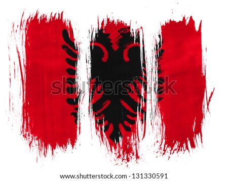 Albania. Albanian flag painted with 3 vertical  brush strokes on white background