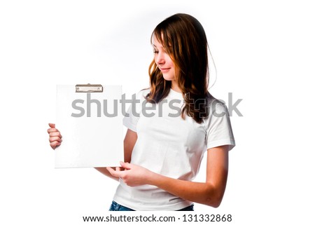 young and beautiful girl with a blank sheet of white