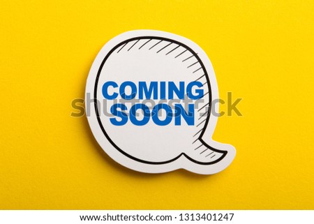 Coming Soon speech bubble isolated on the yellow background.