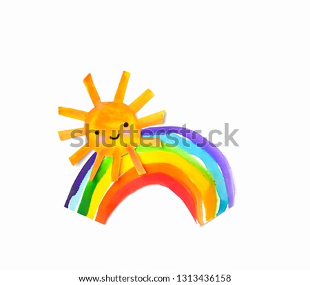 paper sun and rainbow on white paper. good weather. joy, creativity, happiness, childhood creative concept. copy space