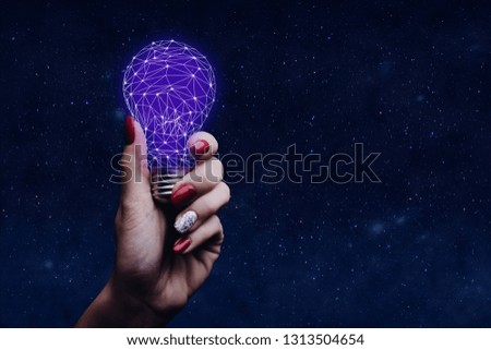 Woman holding abstract lightbulb. Mixed media.