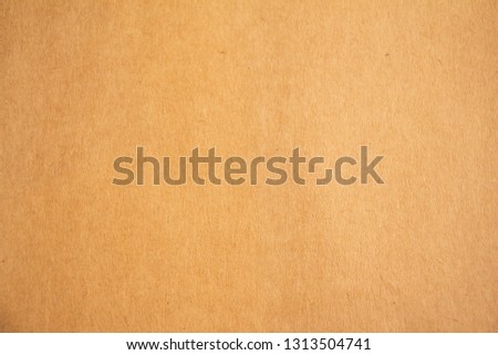 Brown paper cardboard texture for background.backdrop for art work design or add text message.