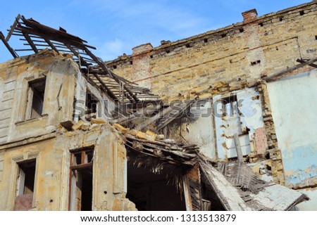 Earthquake disaster. Old destroyed house Royalty-Free Stock Photo #1313513879