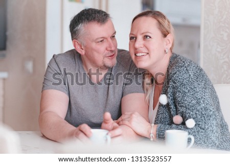 man and woman in the house Royalty-Free Stock Photo #1313523557