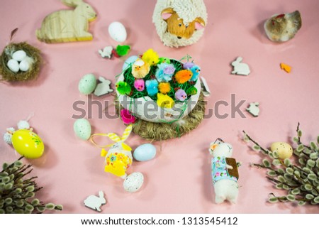Easter background with Easter bunny, catkins, sheep, lamb, chicks, easter eggs