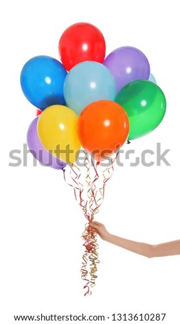 Woman holding bunch of bright balloons on white background, closeup