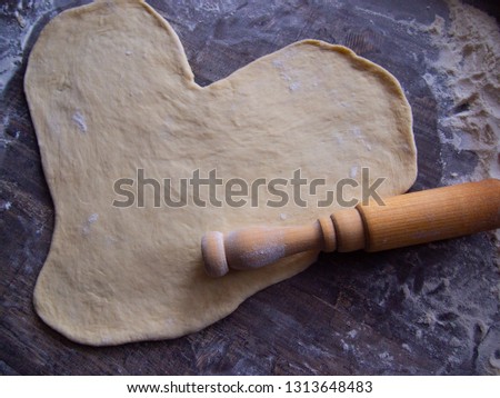 freshly prepared dough and flour