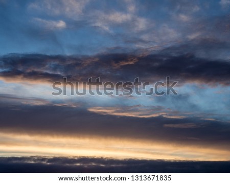 Beautiful background nature image capturing morning sunrise sky, clouds and in different colors. 