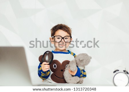 education, technology and learning concept - happy boy with pc computer and notebook learning at home - Image