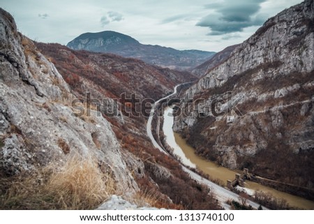 Beautiful photo of the canyon in Serbia, with river and the highway in the middle. Autumn colors
