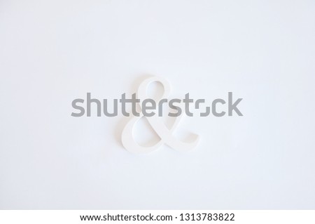 white ampersand sign on a white background