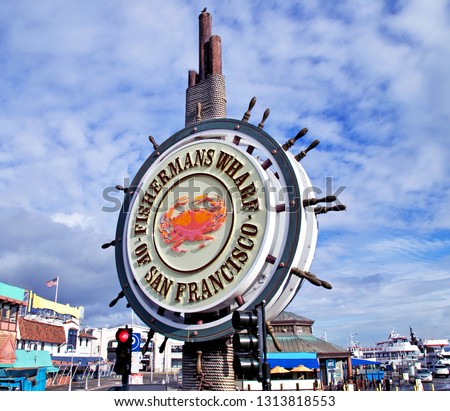 Fisherman's Wharf sign of San Francisco on a beautiful sunny blue sky day. Royalty-Free Stock Photo #1313818553
