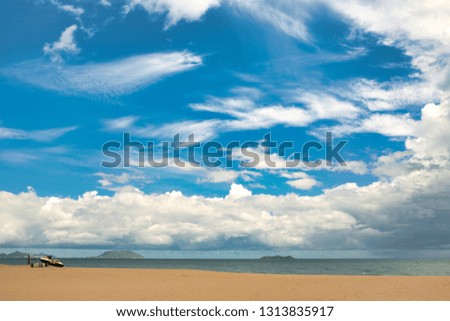 Beautiful view of the beach, sea and blue sky on the island of Hainan.
