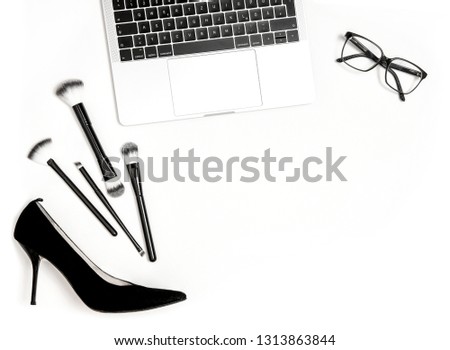 Fashion flat lay for blogger social media. Notebook and feminine accessories on white background