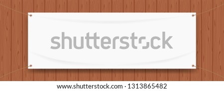 vinyl banner blank white isolated on wood frame background, white mock up textile fabric empty for banner advertising stand hanging, indoor outdoor fabric mesh vinyl backdrop for presentation poster Royalty-Free Stock Photo #1313865482