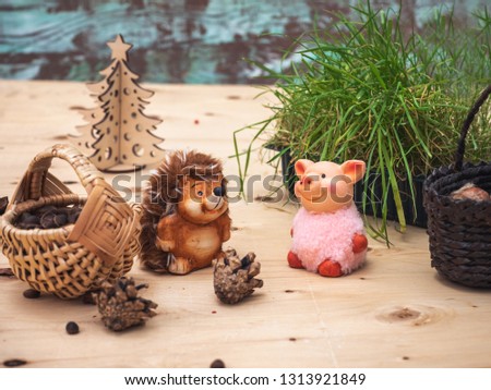 fairytale picture, Hedgehog and pink pig met in the forest for the harvest of nuts
