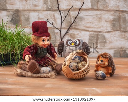 Dreamlike card with toy characters. Three friends are resting on a forest clearing. They carry a large basket of quail eggs.