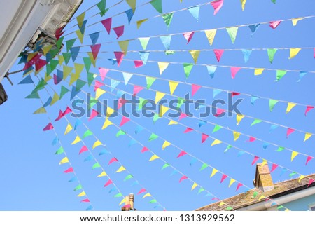 Colorful bunting against a blue sky
