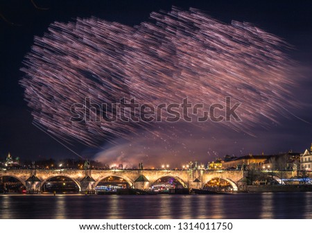 A fireworks show near the historical Charles Bridge in the centre of Prague